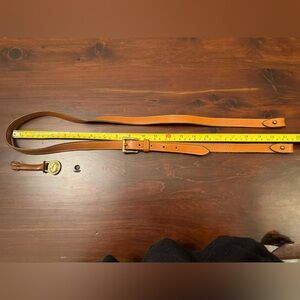 Vintage Dooney and Bourke shoulder strap and brass duck charm.